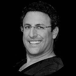 Portrait of Dr. Matthew J. Elias in clinical white coat.